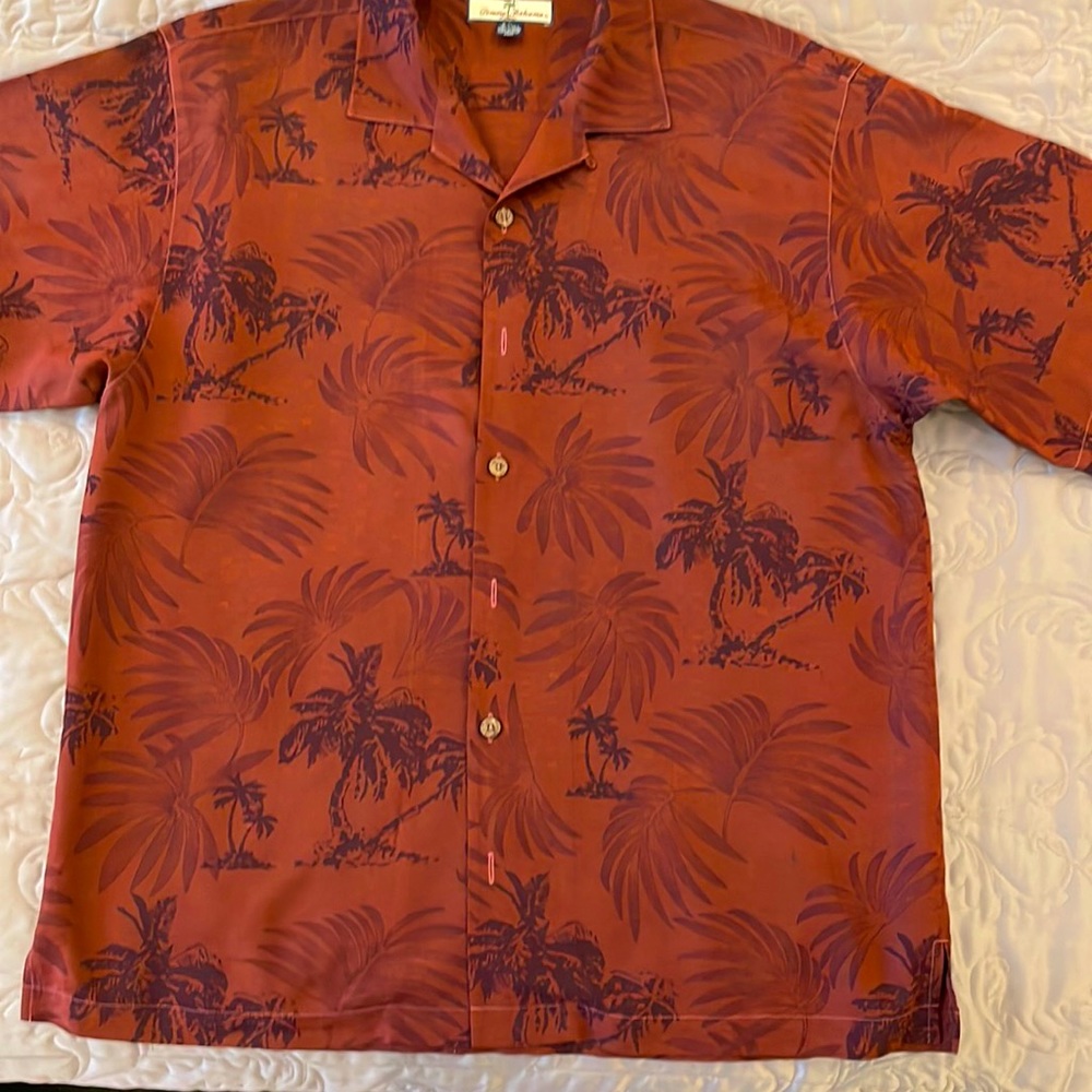 Tommy Bahama short sleeve. 100% silk, machine washable or dry clean.